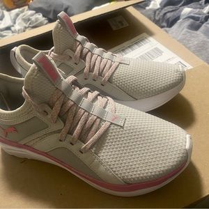 Puma size 4.5 but fits a 6 in womans